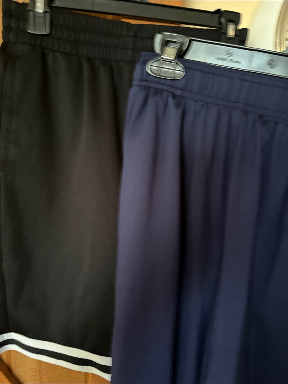 Puma Black Athletic Shorts with White Hem Stripes; New Balance Navy shorts